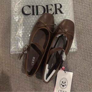 Brown ballet flats with bow